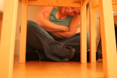 Flick under the table